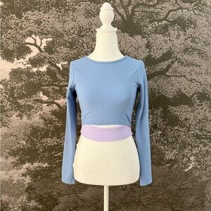 YEAR OF OURS Cropped cutout two-tone stretch-jersey top